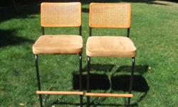 This pair of beautiful bar stools are comfortable and elegant (only about a year old). Soft cushioned seats, 29 inch high ? caned woven back rest.