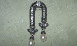 JUST REDUCED FOR QUICK SALE!!!
Beautiful Marcasite-Sterling and Real Pearls Pin!! I had real pearls added to this wonderful piece. This would be a wonderful Christmas gift for a business woman or Grandma to wear to church on Sunday. It has an antique look