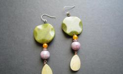 &nbsp;Big Bold Unique&nbsp;Boho&nbsp;Earrings designed&nbsp;green and yellow jade mixed with&nbsp;purple lilac stones and copper.
https://www.etsy.com/listing/227823877/long-boho-earrings-green-jade-earrings?ref=listing-shop-header-0