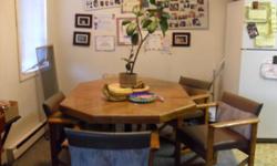 very nice oak dining room table with chairs,and leaf to make larger,thank you,,,