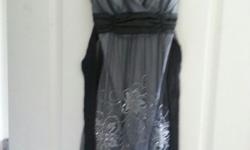 Black tea dress with silver beading. Worn only once. Very good condition. Size small
&nbsp;
Email me if interested. Thank you!
&nbsp;