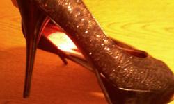 Black glittery open toe heels about 5in brand new never worn. Size 9 call/text --