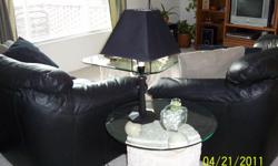 Black leather sofa and love seat - excellent condition
call 406-570-0517