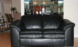 High quality black leather sofa and loveseat. No scratches or tears. Pet free, smoke free, children free.