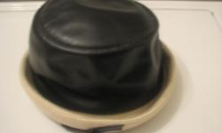 this hat is fantastic&nbsp;&nbsp; excellent condition&nbsp; from the 50's?? blue&nbsp; leather as seen&nbsp; it comes with a very colledtible hat box&nbsp;&nbsp; that&nbsp; says" mr. john&nbsp; new york/ paris&nbsp;&nbsp; both the hat& box are in very