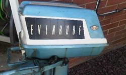 5.5 Evinrude boat Motor, not sure of the year, ran great two years ago!!