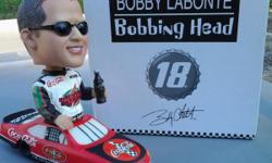 Nascar's elite Bobby LaBonte #18 ... stands about 9 inches tall...&nbsp; Arbys's/Coca cola special promotion... Heavy... want last long... Calls only&nbsp;&nbsp; Ken