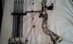spothog sight 5 pin, Ultra-rest, 6 gouldtip arrows, 8 arrow quiver apg camo ready to hunt. 29in Draw. Like new. Used very little.