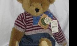 Teddy Beanberger plush Boyds Bear
style #9118
approximately 16 inches high
issued 1995, retired 1997
Comes without the price tag in the picture.
Comes with hang tag which has name written on the front and is creased a lot.
In great condition and displayed