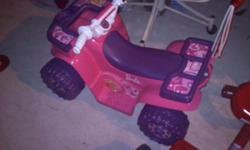 PINK AND PURPLE ATV, COMES WITH BATTERY CHARGER, ALREADY PUT TOGETHER, NEVER BEEN USED