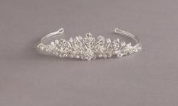 Beautiful midsize Tiara with Swarovski crystal, delicate pearls, and rhinestones. Silver. Never been used, still in box. Great Deal-originally $110-. T7548.