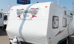 Brand new 2013 Wildwood 195BH travel trailer that would be the perfect "on the road home" for one to three adults or a great family starter camper. This has the bunks in back and a nice front bed, bathroom and kitchen. A/C unit as well. The price is under