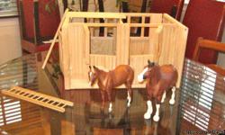 Pristine condition, made completely out of wood. One horse is a type of draft horse and the second is a quarterhorse (I don't know the specific breeds). I believe both the horses and the barn are retired.&nbsp;