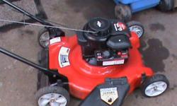 Briggs & Stratton 500 Series push lawnmower. 22inch cut. 158cc. No Bag. Just like new. I have only used it four times.