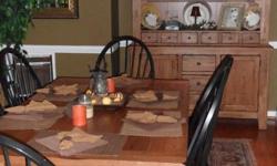 Dining Room Set Includes: China Cabinet, Table with two extension leaves, Six chairs (2 arm chairs and 4 side chairs). Purchased brand new from Belfort Furniture, excellent condition. We are moving and have a new dining room set for our new house so we