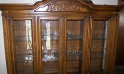 Selling Broyhill Oak Hutch
This is a two piece Huch with the china cabinet that measures 67" long x 19" wide x 78" tall
all glass shelving included, this china hutch is in very good condition.