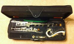 The Buffet 1193 Prestige Bass Clarinet features both excellent sound and great projection. With a range to low C, the Buffet 1193 bass clarinet is the most popular choice for orchestral or wind ensemble performing. The full grenadilla wood body ensures a