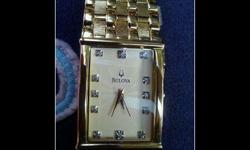 bulovas men watch 12 diamonds one for every hour gold tone watch, $150!! firm price