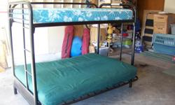 Excellent condition!!
Black metal frame with twin-size bunk and full-size futon mattresses.
Please call --