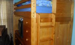 Solid wood loft bed with desk and trundel bed, storage space and build in drawers. Mattresses included. Excellent condition