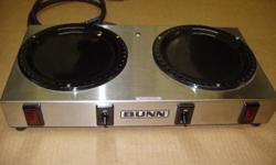 This is a BUNN model WX-2 warming plate. It has 2 separately controlled warmers with indicator lights to let you know when the plate is on. It was made in May of 2001. Plugs into regular 120V 15A outlet. Very good condition and works good, but sold as is.