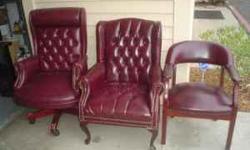 burgundy office chairs with and without rollers