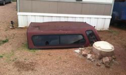 Red CAMPER SHELL fits a LONG BED TRUCK. ALL Windows ARE Good doesn't leak. MOVING MUST SELL!