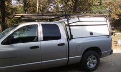 Swiss Cargo work shell; 23" to 29" wedge height front / sliding glass window to truck cab / locking side and rear doors /10' steel Ladder rack fits around shell, mounts to truck and not the rack.
Paid $2,742.00 asking $1,800.00 OBO.