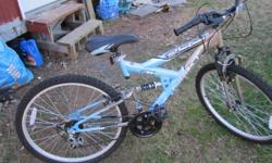 GIRLS BIKE , 18 SPEED IN GREAT CONDITION. RODE VERY LITTLE.