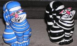 CAT SALT AND PEPPER SHAKERS
Pre-Owned but never used
Ceramic
4 inchers tall
1 black cat and 1 blue cat
Artist-Lynda Corneille
Sealed with a Kiss, Character Collectibles
No chips or cracks
This item is currently on auction and to view the status please