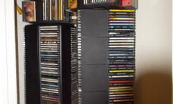 My entire collection of 1150 cds includes 4 spin towers, 3 wall racks & lots of misc. items