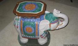 This is a hand painted ceramic elephant end table. It is in excellent condition. It can be used as a plant stand or any type of night stand, etc.
Must see!!