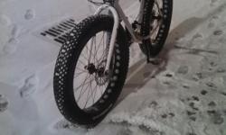 Charge fat bike, size medium. Avid elixr 1 hydros, thomson stem for a little rise. Full x5 sram 2x10. Shimano spd pedals. Vee rubber/surly tires. Usually suggest 10-12psi for moderate weight riders, can go as low as 8psi for lots of snow/mud. Most fun ive