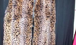 Real Cheetah, Coat is mid length, size S-M, very beautiful, soft, never worn, found one online for 500.00. I love this coat, but I am not into browns, other wise I would keep it. Make a decent offer. --