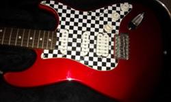 Cherry Red Fender Squire Strat, checkerboard face plate, comes with a case and a neck strap. I am asking $150 for it.