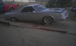 Gray in and out custim and with airbrush on the hoon and on the back window ist a low rider show car with chich and chong and with hydos and cut on 13s spokes