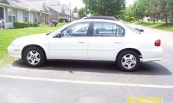 White, warranty, 62,000 miles, alarm/remote start system, fairly new tires, new battery, good gas mileage