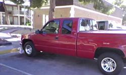 What a truck! This 1991 Chevy Silverado comes with custom interior,custom headlights and taillights, custom rims, slip hitch trailer hitch, 10 play CD player with removable radio face, Hard cover over bed with locks and interior bed liner. This red beauty