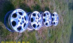 Complete set of 4 original chrome 16 inch rims with inserts. Good appearance. These are about $80 EACH at tire stores.&nbsp;&nbsp; $135 or make offer.&nbsp; Calls only at 810 836 zero six fore zero.