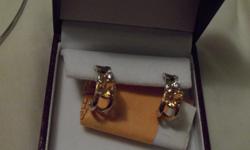 Pierced earrings, post with push on back, 14k gold, new never worn.
Cash only