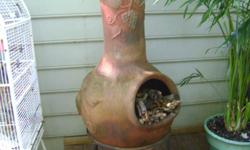 Clay Chimnea. Excellent for out on the deck on cold evenings and mornings. Moving and have to sell.