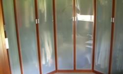 Total of 8 closets, cherrywood in color, approx. size: 7' 9" h x 2' 7.5" w x 2 3/4' d. All have two doors, except two of them only have one and are the same height and depth, but the width is a little smaller. They all have frosted doors and come with