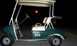 CLUB CAR WITH TOP, TROGAN BATTERIES, GOOD TIRES AND BRAKES. INCLUDES CHARGER. $950 CASH. CALL 843-424-9522