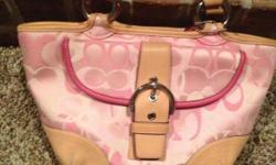Gently used pink and brown coach