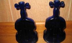 2 RARE FIDDLE SHAPED BOTTLES FOR SALE. $10 EACH. 561-688-3530