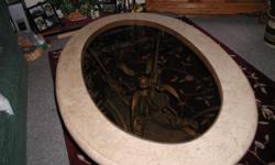Oval 52x34x20 Coffee table, tan Faux Marble, beleveld glas inset, Bronze base
exellent condition
asking $150
call 503-519-3321