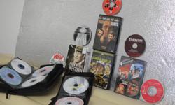 Take home these CDs and DVDs! DVDs are a John Wayne Western 3-pack, Circus World, Boondock Saints and more John Wayne! &nbsp;Also included are a &nbsp;range of CDs in two carrying cases, including Ozzy Osbourne, Eminem, Eddie Van Halen, Bachman Turner