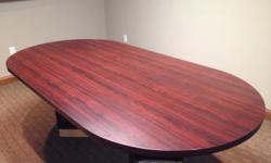 4' x 8' oval conference room table that can comfortably seat 8
&nbsp;