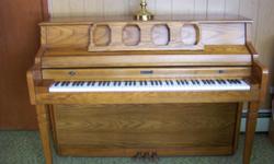 Console Kimball Piano. Beautiful piece of furniture for your home. In Excellent Condition. Comes with books, bench and light. Purchased years ago for $2500, this piece of furniture is a must see. Two daughters, now all grown took piano lessons. Piano is
