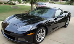 This Corvette has BLACK exterior and CASHMERE interior, 400hp LS2 engine, with Six-Speed Manual transmission and features the $4945 3LT PERFERRED EQUIPMENT GROUP. This includes the Heads-up display, AM/FM Stereo, 6 Disc CD changer with the (U65 group)